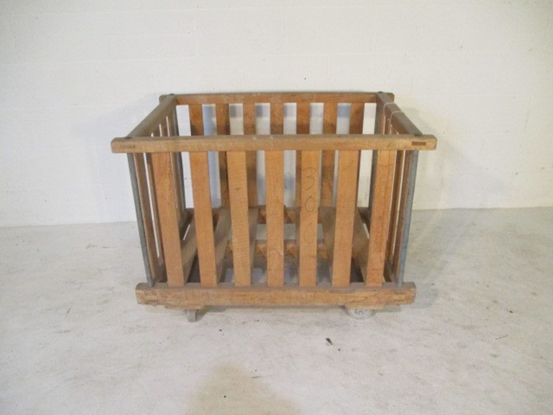 An industrial slatted wooden bobbin trolley - length 106cm, width 69cm