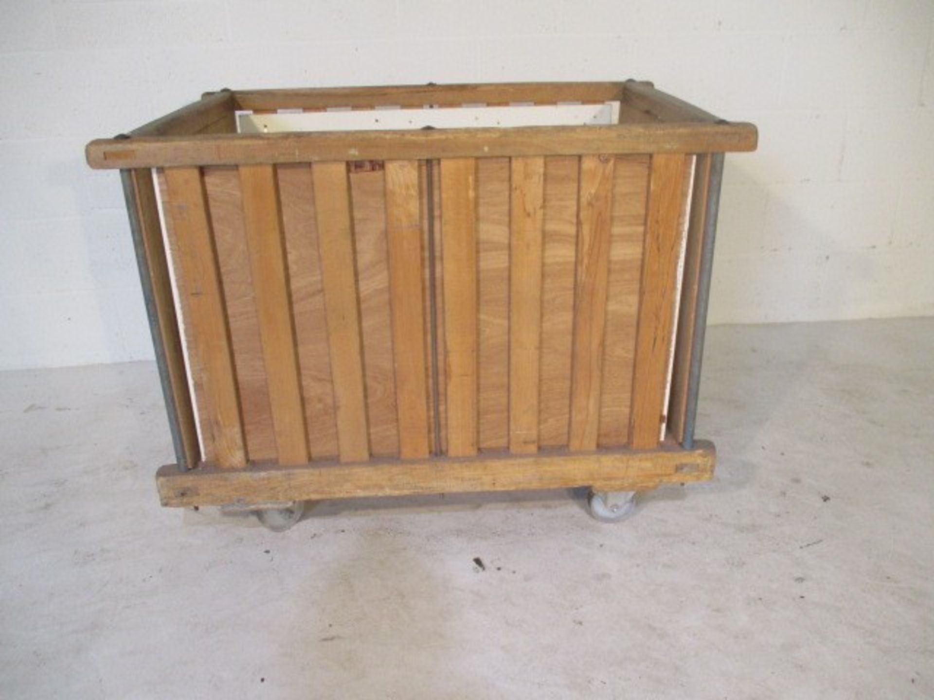 An industrial wooden bobbin trolley - length 107cm, width 70cm