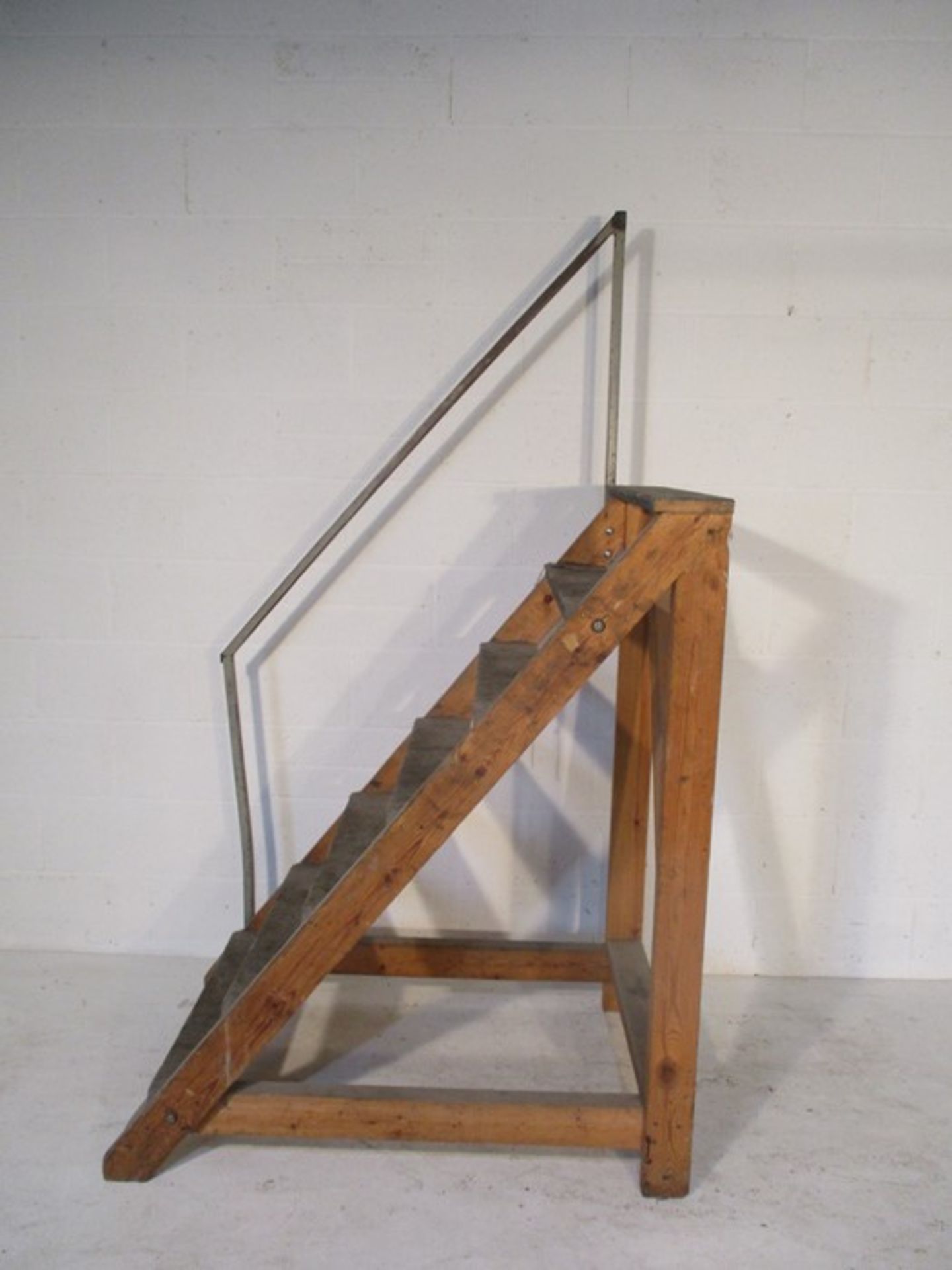 A set of handmade steps with rail