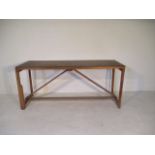 A handmade trestle style table, 205cm x 72 cm x 89 cm