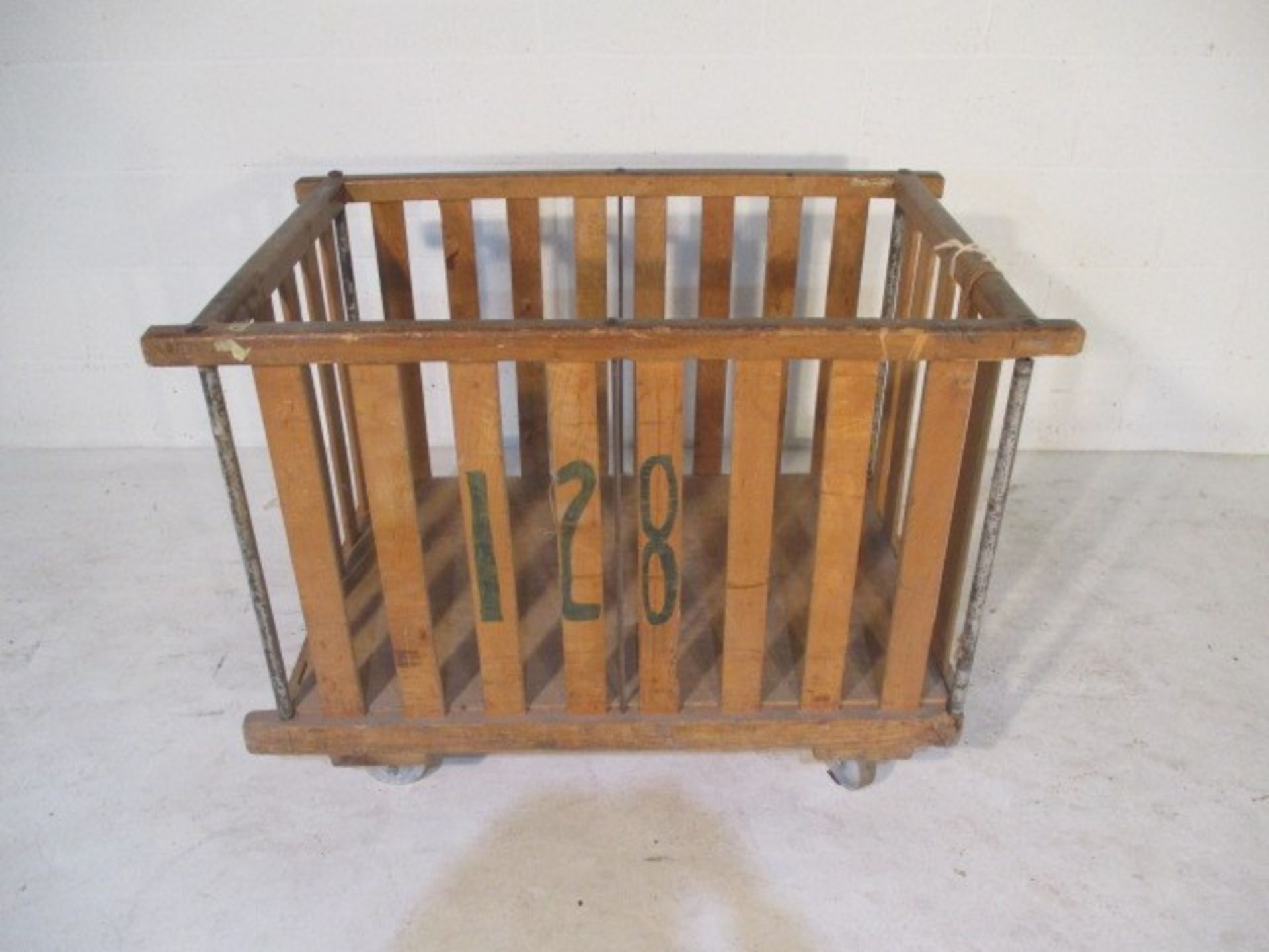 A slatted wooden bobbin trolley - length 110cm, width 70cm