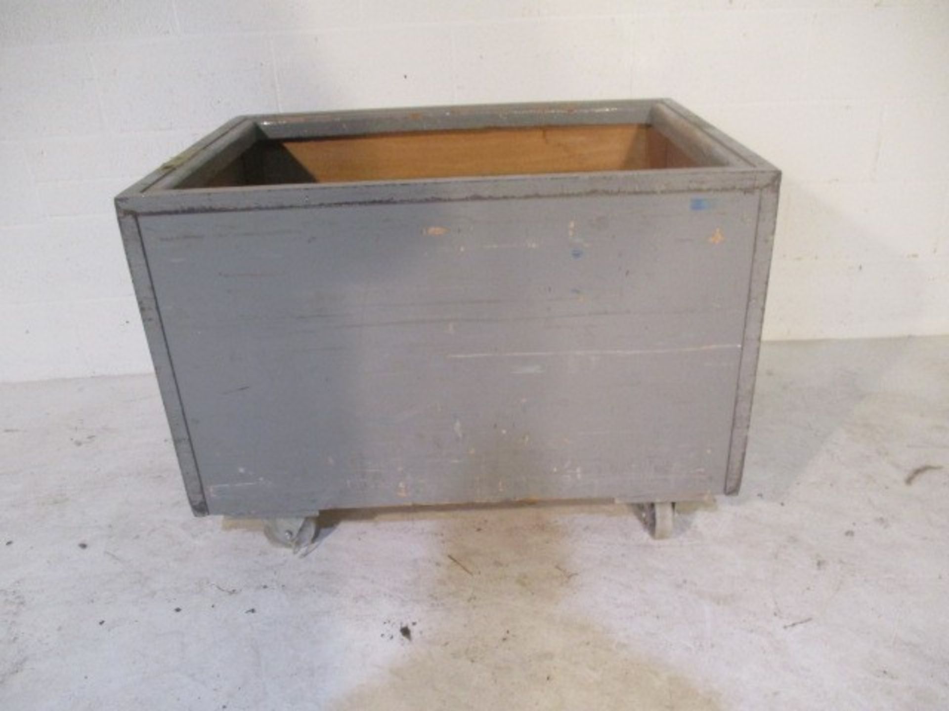 An grey painted industrial trolley with metal edging - length 102cm, width 72cm