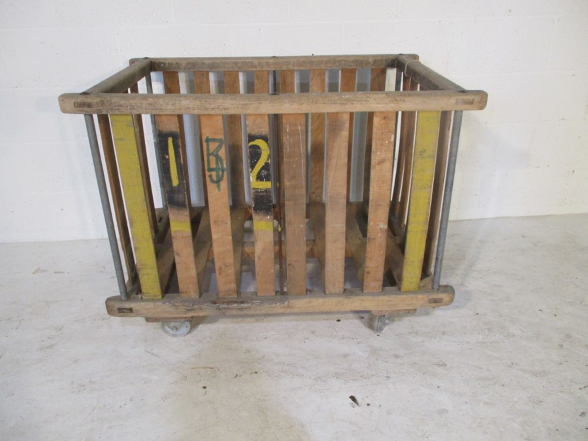 An industrial slatted wooden bobbin trolley - length 108cm, width 70cm