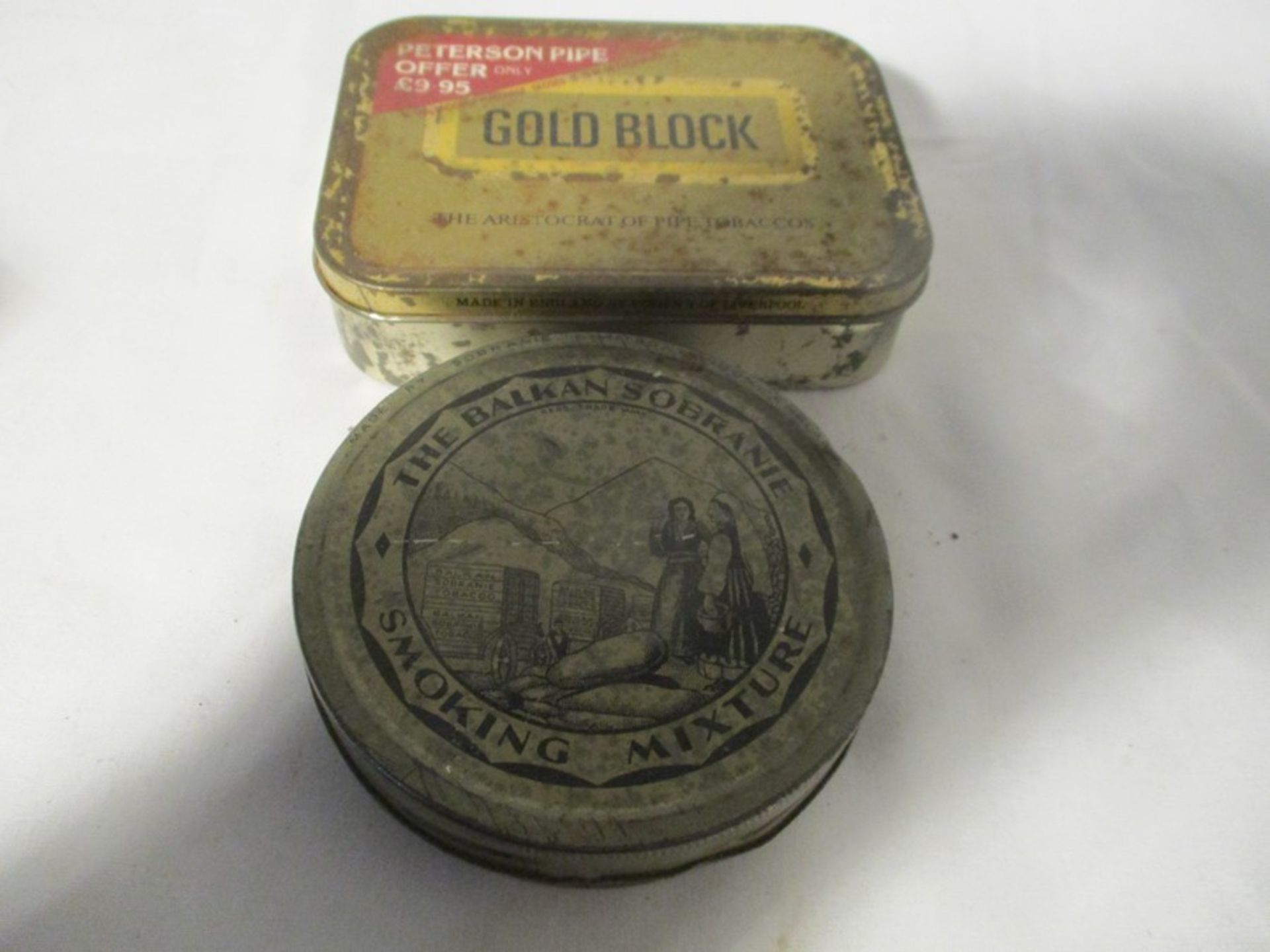 A collection of miscellaneous items including vintage tins, cast iron stamp, microscope ( A/F) etc. - Image 6 of 10