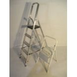 A set of Werner aluminium step-ladders, along with a set of steps