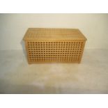 A wooden laundry basket