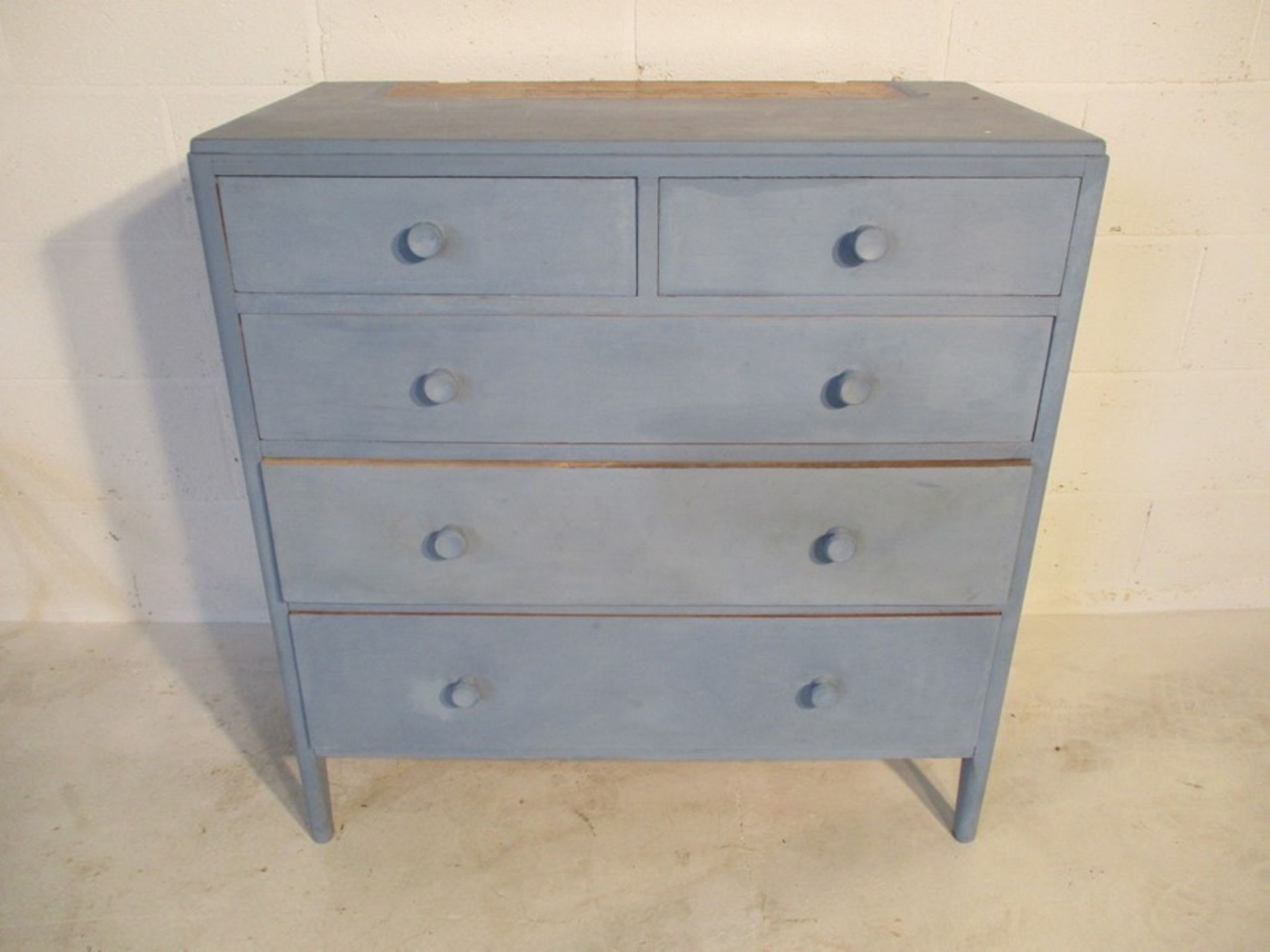 A painted chest of five drawers