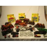 A collection of mainly vehicle related items including Avon bottles, metal and wooden models,