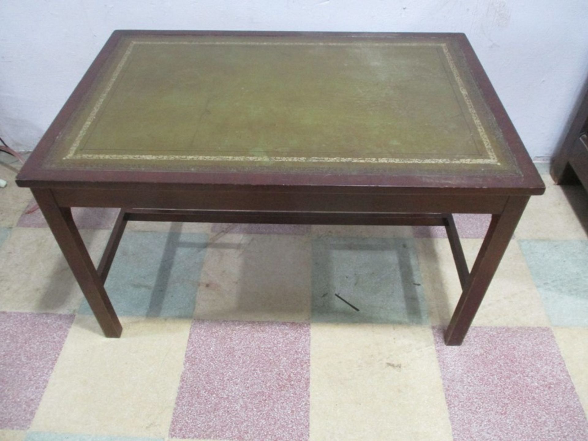 A leather topped occasional table
