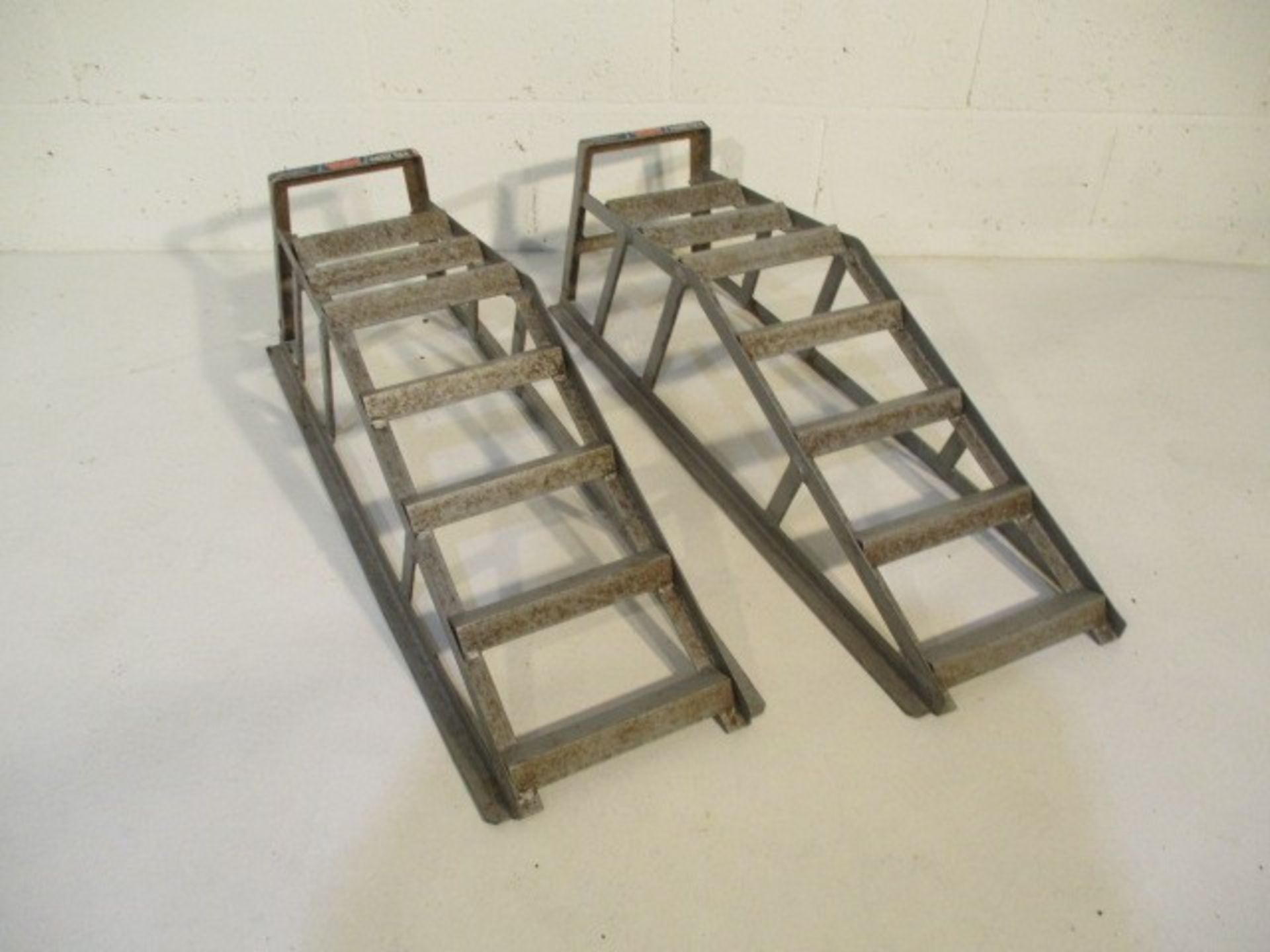 A pair of Master Mechanic SWL100KG car ramps
