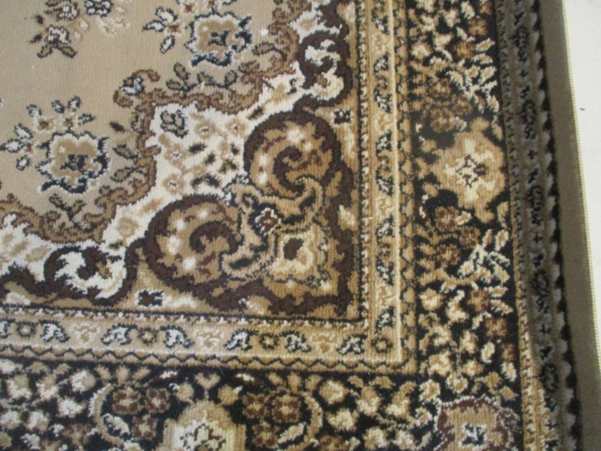 A brown patterned rug - Image 2 of 6