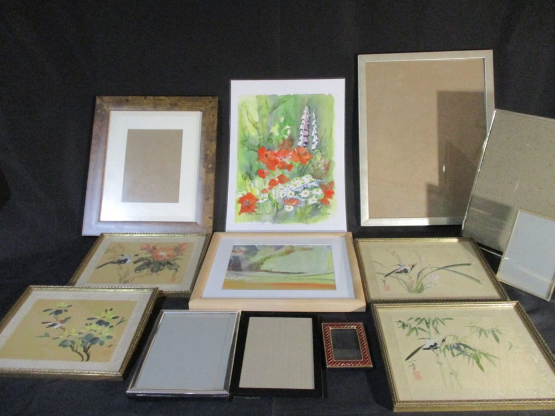 A set of four framed oriental paintings, along with a selection of various sized frames, mounts,