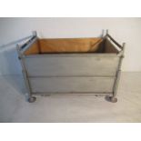 A metal industrial stackable trolley with ply lining, 126 cm x 78 cm