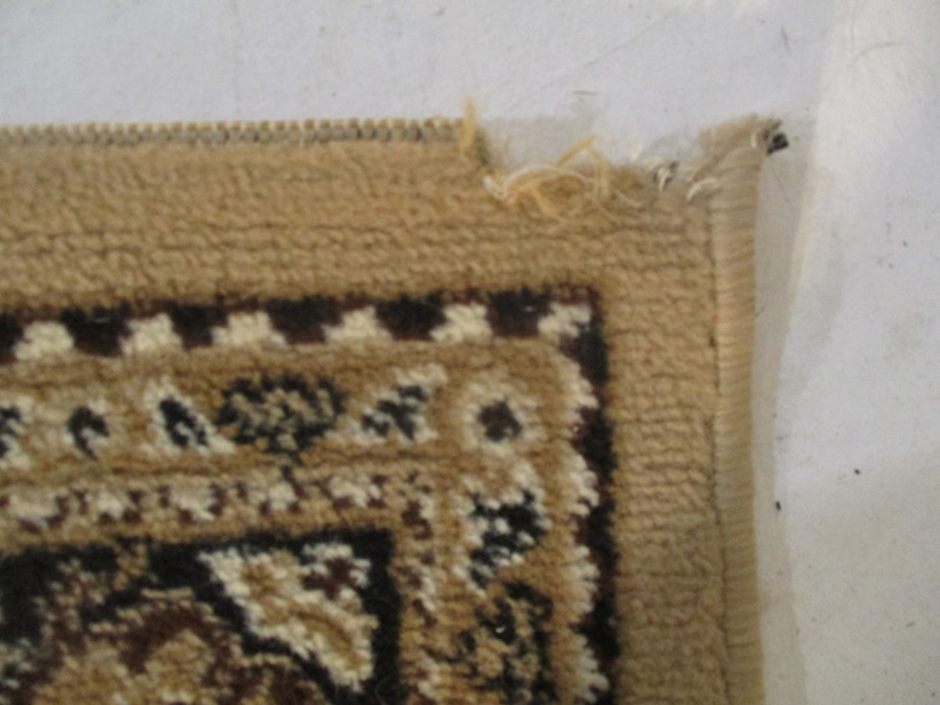 A brown patterned rug - Image 4 of 6