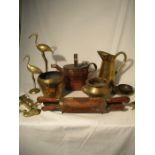 A collection of brass and copper items including a copper watering can etc.