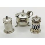 A hallmarked silver mustard pot with blue glass lining, along with silver salt and pepper pots