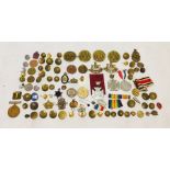 A collection of military buttons, badges and medallions etc including a George V medal "For the