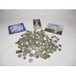 A collection of various foreign coinage, a Royal Mint uncirculated pound coin 1983, Heinz Royal Mint