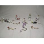 A collection of various porcelain bathing belles