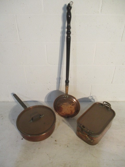 A large copper lidded saucepan (Stockholm), along with copper pan and bed warmer