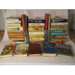 A collection of various books including To Kill a Mockingbird (1st edition), Doctor Zhivago, Peter