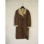 A long sheepskin coat