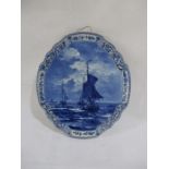 A Dutch Delft blue and white wall hanging plaque of sailing ships - height 41cm