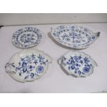 Four pieces of Meissen onion pattern including two leaf shaped plates, a shaped dish along with