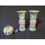 A pair of Oriental Famille Rose vases along with a ginger jar and one other (A/F)