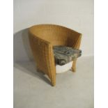 A modern wicker tub chair