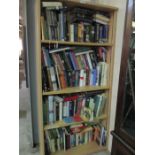 A large collection of books including art, historical and autobiographical etc .over four shelves