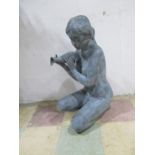 A zinc water feature sculpture of a kneeling nude lady pouring a water jug. Height approx.78cm
