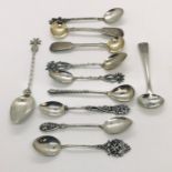 A collection of eleven silver and continental silver spoons