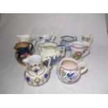 A collection of various jugs including Poole, Royal Doulton, Aynsley etc