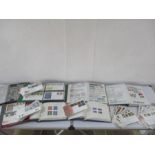 A large collection of stamps and first day covers