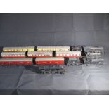 A collection of four Triang double OO gauge Engines plus rolling stock.