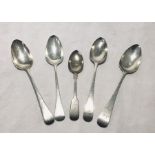 A collection of four hallmarked silver serving spoons and one dessert spoon