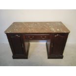 A James Phillips & Sons (Bristol) dressing table with marble top, single drawer and two doors