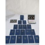 A collection of Royal Mint coin sets including a number of "Britain's First Decimal Coins"