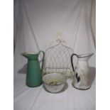 Two enamelled jugs along with a wrought iron hanging shelf etc.