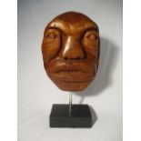 An Indian art carved head sculpture from the Coast Salish people of Canada by Stan Jospeh