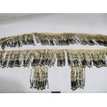 A section of art deco beaded fringing