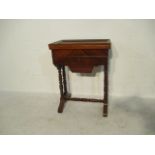 A Victorian sewing box on turned legs - Key in office