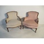 A matched pair of French Louis XV style armchairs