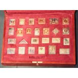 A cased set of silver ingots from "The Empire Collection" of postage stamps from around the world