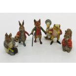 A collection of cold painted bronze Beatrix potter figures including Peter Rabbit, Jemima Puddleduck