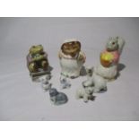 Three Beswick Beatrix Potter figurines along with wade whimsies, minikins etc.