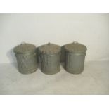 Three galvanised dustbins