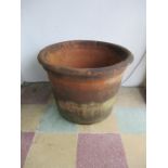 A large terracotta garden pot A/F - height 52cm, diameter 70cm