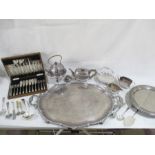A collection of silver plated items including a large serving tray, teapots, canteen of fish